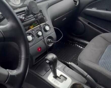 Черный Мицубиси Аутлендер, объемом двигателя 2.38 л и пробегом 220 тыс. км за 7500 $, фото 8 на Automoto.ua