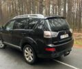Черный Мицубиси Аутлендер, объемом двигателя 2 л и пробегом 280 тыс. км за 4500 $, фото 3 на Automoto.ua