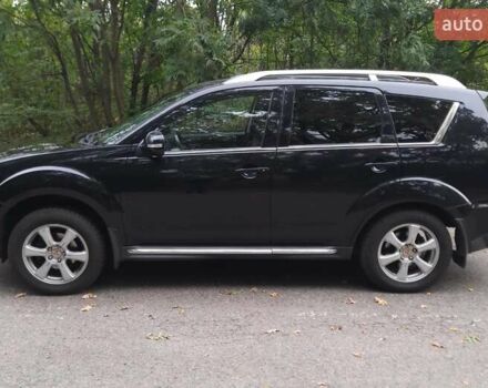 Чорний Міцубісі Аутлендер, об'ємом двигуна 2 л та пробігом 220 тис. км за 10700 $, фото 2 на Automoto.ua