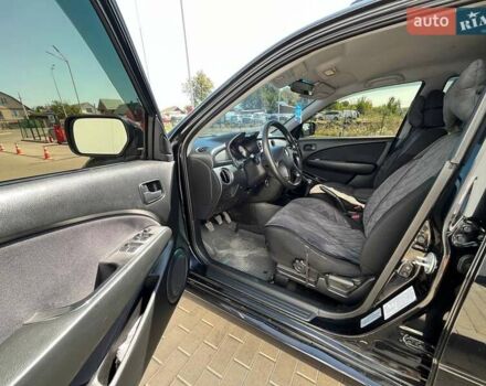 Черный Мицубиси Аутлендер, объемом двигателя 2 л и пробегом 236 тыс. км за 6699 $, фото 14 на Automoto.ua