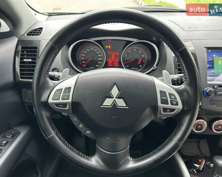 Черный Мицубиси Аутлендер, объемом двигателя 3 л и пробегом 77 тыс. км за 11800 $, фото 32 на Automoto.ua