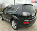 Черный Мицубиси Аутлендер, объемом двигателя 3 л и пробегом 77 тыс. км за 11800 $, фото 4 на Automoto.ua