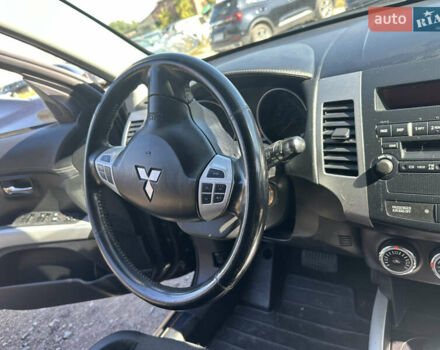 Черный Мицубиси Аутлендер, объемом двигателя 2 л и пробегом 240 тыс. км за 10999 $, фото 30 на Automoto.ua