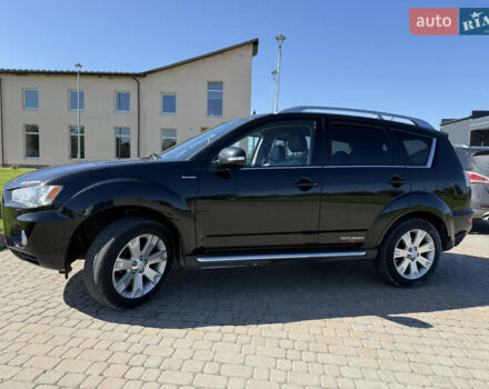 Чорний Міцубісі Аутлендер, об'ємом двигуна 2.36 л та пробігом 235 тис. км за 12500 $, фото 23 на Automoto.ua