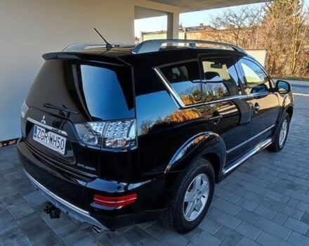 Черный Мицубиси Аутлендер, объемом двигателя 2 л и пробегом 264 тыс. км за 2900 $, фото 7 на Automoto.ua