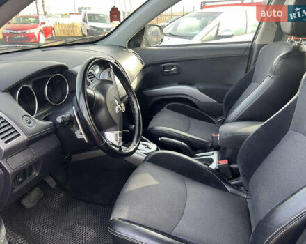 Чорний Міцубісі Аутлендер, об'ємом двигуна 2.36 л та пробігом 244 тис. км за 9850 $, фото 9 на Automoto.ua