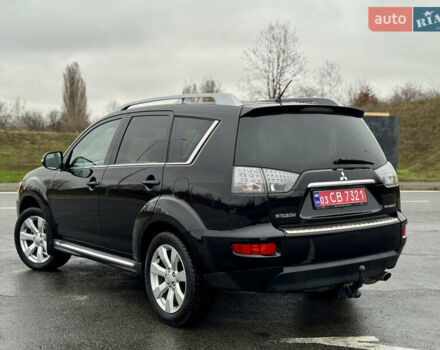 Чорний Міцубісі Аутлендер, об'ємом двигуна 2 л та пробігом 228 тис. км за 10550 $, фото 4 на Automoto.ua