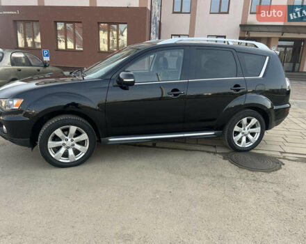 Черный Мицубиси Аутлендер, объемом двигателя 2.36 л и пробегом 244 тыс. км за 9850 $, фото 4 на Automoto.ua