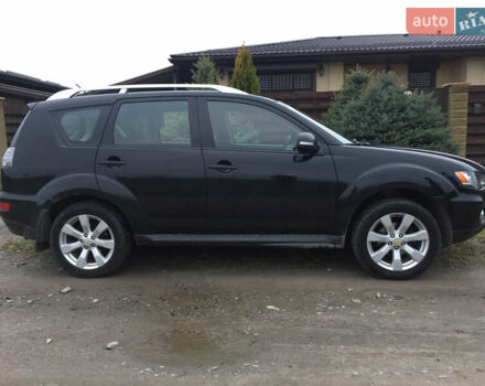 Черный Мицубиси Аутлендер, объемом двигателя 2.36 л и пробегом 315 тыс. км за 9700 $, фото 5 на Automoto.ua