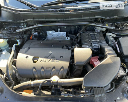 Чорний Міцубісі Аутлендер, об'ємом двигуна 2.4 л та пробігом 245 тис. км за 10950 $, фото 21 на Automoto.ua