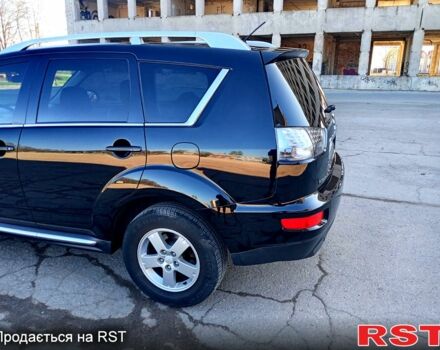 Черный Мицубиси Аутлендер, объемом двигателя 2 л и пробегом 224 тыс. км за 12300 $, фото 3 на Automoto.ua