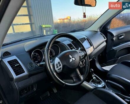 Черный Мицубиси Аутлендер, объемом двигателя 2.2 л и пробегом 264 тыс. км за 10700 $, фото 22 на Automoto.ua
