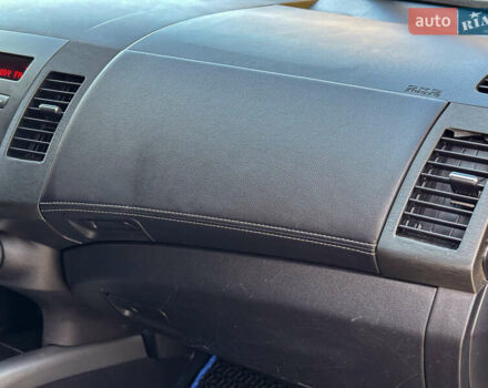 Черный Мицубиси Аутлендер, объемом двигателя 2.2 л и пробегом 226 тыс. км за 11500 $, фото 100 на Automoto.ua