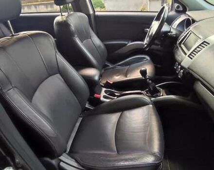 Черный Мицубиси Аутлендер, объемом двигателя 2 л и пробегом 210 тыс. км за 10600 $, фото 17 на Automoto.ua