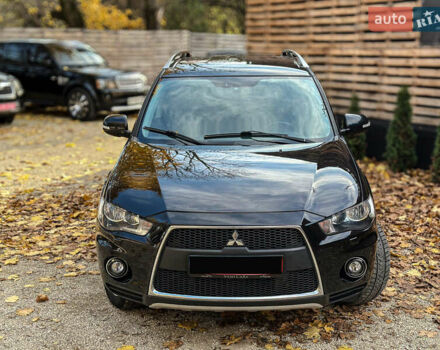 Черный Мицубиси Аутлендер, объемом двигателя 2.2 л и пробегом 226 тыс. км за 11500 $, фото 11 на Automoto.ua