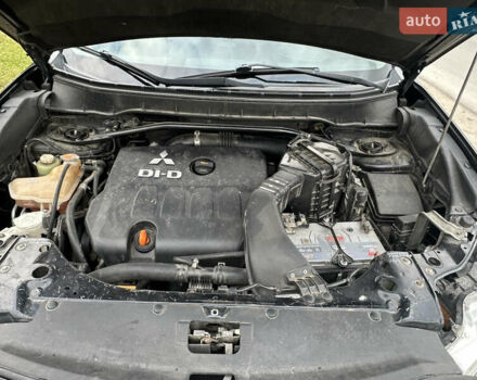 Черный Мицубиси Аутлендер, объемом двигателя 1.97 л и пробегом 224 тыс. км за 9000 $, фото 15 на Automoto.ua