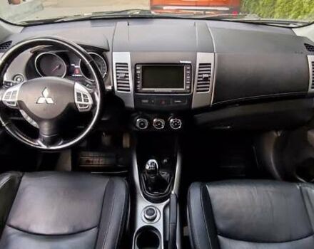 Черный Мицубиси Аутлендер, объемом двигателя 2 л и пробегом 210 тыс. км за 10600 $, фото 18 на Automoto.ua