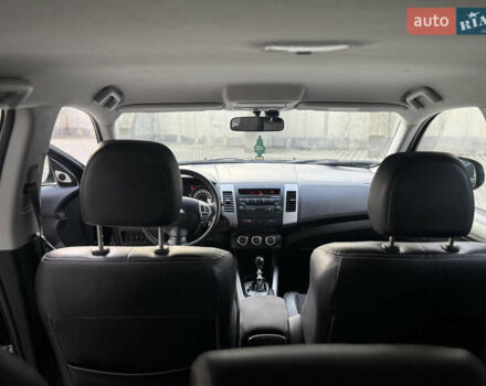 Черный Мицубиси Аутлендер, объемом двигателя 2.2 л и пробегом 225 тыс. км за 10950 $, фото 41 на Automoto.ua