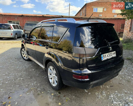 Чорний Міцубісі Аутлендер, об'ємом двигуна 2 л та пробігом 258 тис. км за 8699 $, фото 7 на Automoto.ua