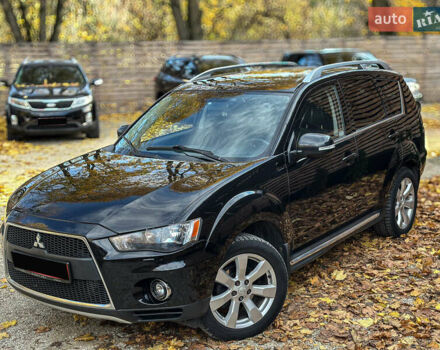 Черный Мицубиси Аутлендер, объемом двигателя 2.2 л и пробегом 226 тыс. км за 11500 $, фото 14 на Automoto.ua
