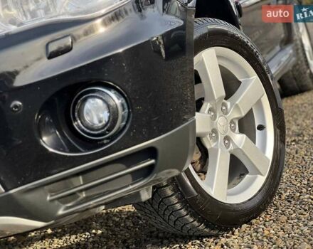 Черный Мицубиси Аутлендер, объемом двигателя 2.18 л и пробегом 249 тыс. км за 11500 $, фото 8 на Automoto.ua