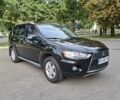 Мицубиси Аутлендер 2010 в Чернигове на Automoto.ua Черный Мицубиси Аутлендер, объемом двигателя 2.4 л и пробегом 180 тыс. км за 11500 $, фото 1 на Automoto.ua