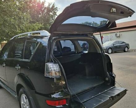 Мицубиси Аутлендер 2010 в Чернигове на Automoto.ua Черный Мицубиси Аутлендер, объемом двигателя 2.4 л и пробегом 180 тыс. км за 11500 $, фото 25 на Automoto.ua