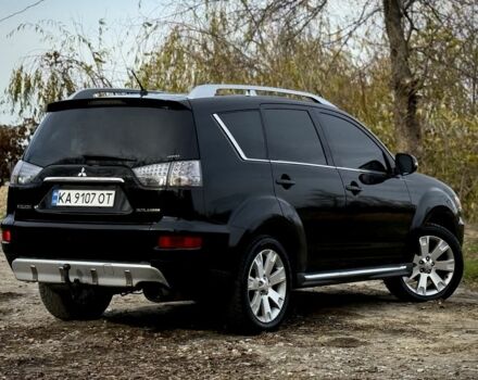 Черный Мицубиси Аутлендер, объемом двигателя 2 л и пробегом 300 тыс. км за 5500 $, фото 4 на Automoto.ua