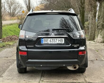 Черный Мицубиси Аутлендер, объемом двигателя 2.4 л и пробегом 197 тыс. км за 11300 $, фото 5 на Automoto.ua