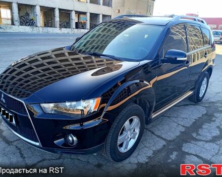 Черный Мицубиси Аутлендер, объемом двигателя 2 л и пробегом 224 тыс. км за 12300 $, фото 2 на Automoto.ua