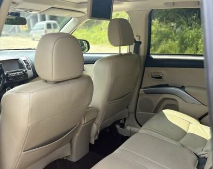 Черный Мицубиси Аутлендер, объемом двигателя 2.4 л и пробегом 275 тыс. км за 12000 $, фото 9 на Automoto.ua