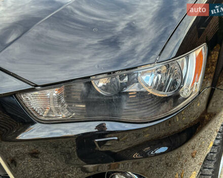 Черный Мицубиси Аутлендер, объемом двигателя 2.2 л и пробегом 226 тыс. км за 11500 $, фото 46 на Automoto.ua