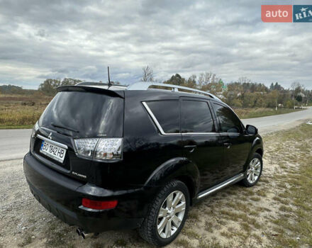 Черный Мицубиси Аутлендер, объемом двигателя 1.97 л и пробегом 224 тыс. км за 9000 $, фото 5 на Automoto.ua