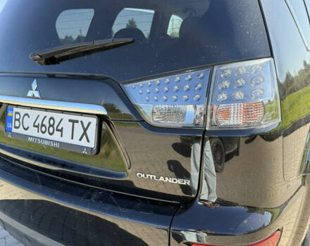 Чорний Міцубісі Аутлендер, об'ємом двигуна 2.36 л та пробігом 235 тис. км за 12500 $, фото 22 на Automoto.ua