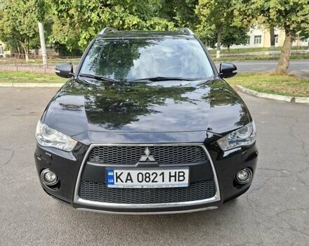 Мицубиси Аутлендер 2010 в Чернигове на Automoto.ua Черный Мицубиси Аутлендер, объемом двигателя 2.4 л и пробегом 180 тыс. км за 11500 $, фото 4 на Automoto.ua