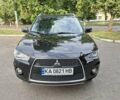 Мицубиси Аутлендер 2010 в Чернигове на Automoto.ua Черный Мицубиси Аутлендер, объемом двигателя 2.4 л и пробегом 180 тыс. км за 11500 $, фото 4 на Automoto.ua