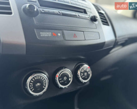 Черный Мицубиси Аутлендер, объемом двигателя 2.2 л и пробегом 225 тыс. км за 10950 $, фото 38 на Automoto.ua