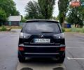 Чорний Міцубісі Аутлендер, об'ємом двигуна 2 л та пробігом 220 тис. км за 9900 $, фото 4 на Automoto.ua
