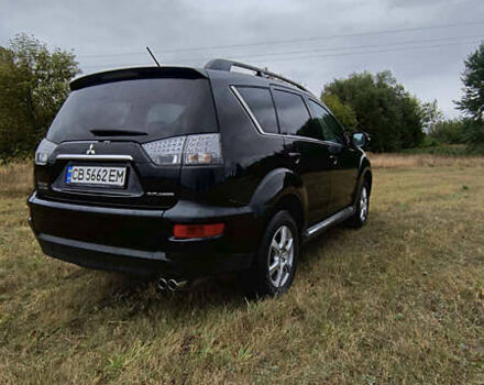 Черный Мицубиси Аутлендер, объемом двигателя 2.27 л и пробегом 238 тыс. км за 11500 $, фото 11 на Automoto.ua