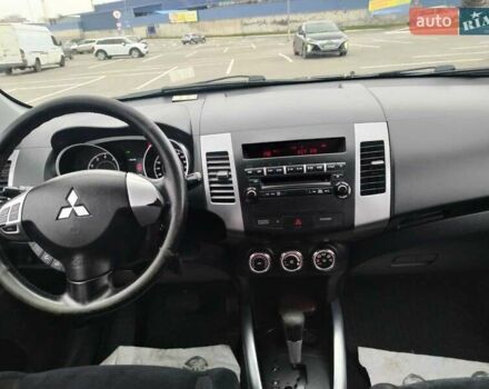 Чорний Міцубісі Аутлендер, об'ємом двигуна 2 л та пробігом 226 тис. км за 10750 $, фото 10 на Automoto.ua