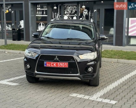 Черный Мицубиси Аутлендер, объемом двигателя 2.2 л и пробегом 225 тыс. км за 10950 $, фото 4 на Automoto.ua