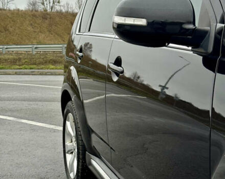 Чорний Міцубісі Аутлендер, об'ємом двигуна 2 л та пробігом 228 тис. км за 10550 $, фото 8 на Automoto.ua