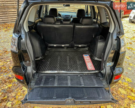 Черный Мицубиси Аутлендер, объемом двигателя 2.2 л и пробегом 226 тыс. км за 11500 $, фото 91 на Automoto.ua