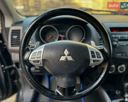 Черный Мицубиси Аутлендер, объемом двигателя 2.2 л и пробегом 226 тыс. км за 11500 $, фото 69 на Automoto.ua