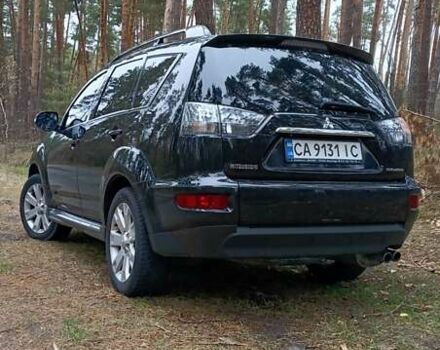Черный Мицубиси Аутлендер, объемом двигателя 2.2 л и пробегом 267 тыс. км за 9999 $, фото 8 на Automoto.ua
