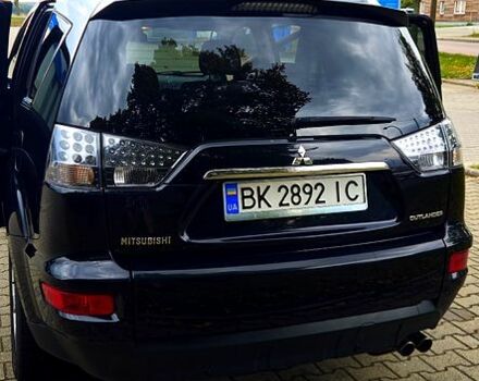 Мицубиси Аутлендер 2010 в Ирпене на Automoto.ua Черный Мицубиси Аутлендер, объемом двигателя 2.2 л и пробегом 219 тыс. км за 11500 $, фото 5 на Automoto.ua