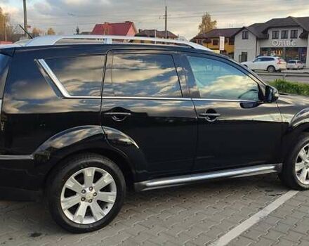 Черный Мицубиси Аутлендер, объемом двигателя 2 л и пробегом 210 тыс. км за 10600 $, фото 7 на Automoto.ua