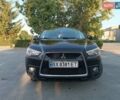 Черный Мицубиси Аутлендер, объемом двигателя 2 л и пробегом 238 тыс. км за 10200 $, фото 1 на Automoto.ua