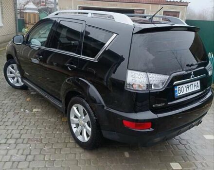 Черный Мицубиси Аутлендер, объемом двигателя 2.2 л и пробегом 225 тыс. км за 11500 $, фото 4 на Automoto.ua