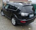 Черный Мицубиси Аутлендер, объемом двигателя 2.2 л и пробегом 225 тыс. км за 11500 $, фото 4 на Automoto.ua